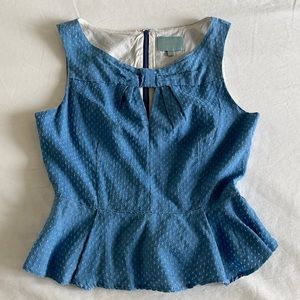 Size M skies are blue peplum top
